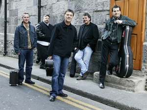 Four Men And A Dog artist photo